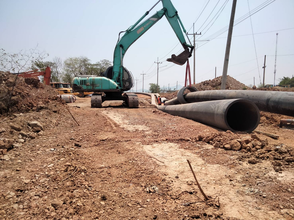 Excavator is helping install concrete pipe on hdpe by pbdsupply